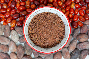 Spice blend made of raw cocoa and dried chili pepper. Spicy cacao condiment top view.