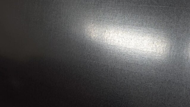 Glide view of aluminium stainless steel titanium metal background texture