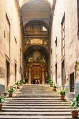 Fototapeta na wymiar Chiostro di San Gregorio Armeno. Entrance of the cloister of Armenian sanctuary in Naples, Italy