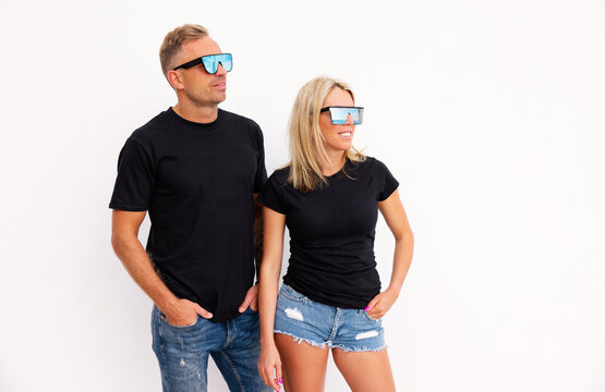 Woman And Man Wearing Casual Black T-shirts, Mockup For T Shirt Design