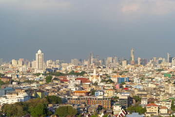 Aerial view of Bangkok Downtown Skyline, Thailand. Financial district and business centers in smart urban city in Asia. Skyscraper and high-rise buildings at sunset.