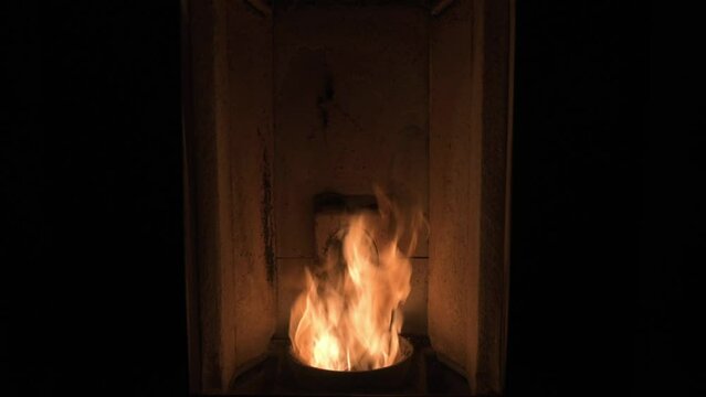 Close up of cozy fire in pellet stove
