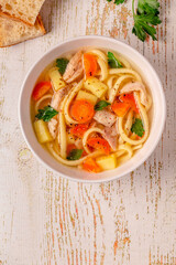 Chicken soup with noodles and vegetables