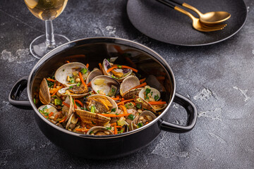 Shells vongole venus clams with vegetables and herbs