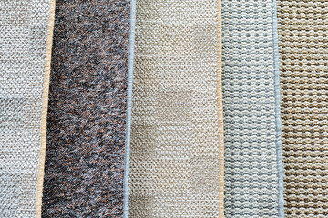 Samples of carpets made of artificial materials with a small pile. flat frame