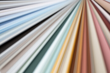 Blurred, out of focus colorful stripes. Abstract composition for background. Pastel colors, soft tones, dynamic lines.