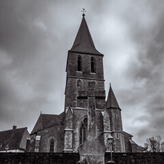 Old church in B&ouml;dingen Germany wiht clouds