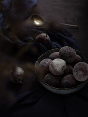 Obraz premium Plum on a dark table.