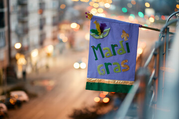Mardi Gras flag on balcony during the carnival.