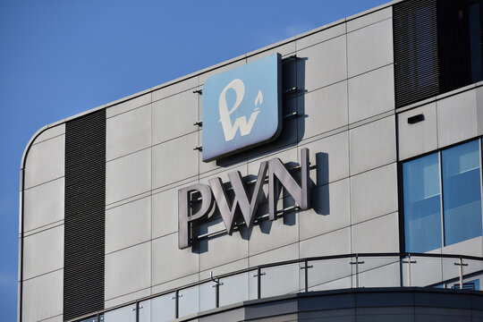 PWN Polish Scientific Publishers logo, signage on the facade of th book publisher office. WARSAW, POLAND - SEPTEMBER 26, 2021
