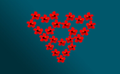 Heart of red flowers on plain teal background, Valentine’s Day post card