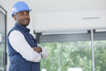 handsome man in builders helmet