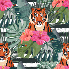 Tropical seamless pattern. Palm tree leaves, flower hibiscus and tiger . Vector illustration. Summer background