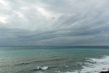 the sea in winter under a cloudy sky