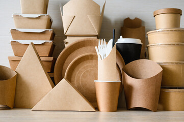 A lot of disposable eco-friendly tableware is on the table. The concept of using disposable paper...