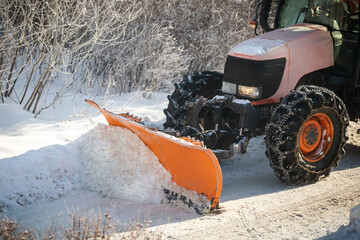 A winter service vehicle (WSV) or snow removal vehicle, clearing thoroughfares of ice and snow