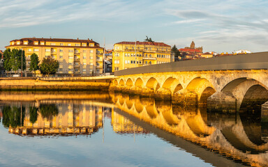 Panoramic view of the Roman bridge and the city of Pontevedra in Galicia, Spain..