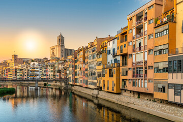 Naklejka na ściany i meble view of the city of Girona in the historic center with the cathedral in Catalonia in Spain at sunset