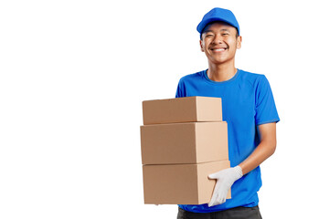 Happy young courier holding a cardboard box and smiling while standing against white background