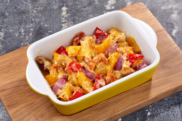 roasted vegetables with meat and cheese