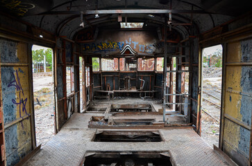 Abandoned old train with rust and graffitis