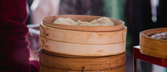 xiaolongbao chinese steamed bun in traditional bamboo steamer