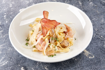 Pasta Carbonara on white plate