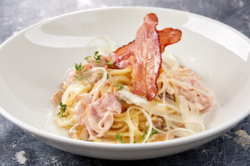 Pasta Carbonara on white plate