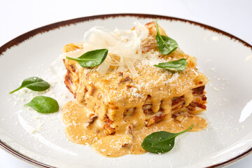 italian lasagna on the white plate