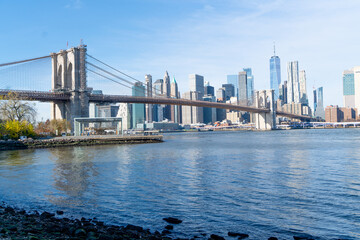 NEW YORK CITY SKYLINE MANHATTAN VIEW FROM BROOKLYN PARK DURING WINTER TIME IN UNITED STATES. TRAVEL, SUNNY DAY AND AMERICA CONCEPT.