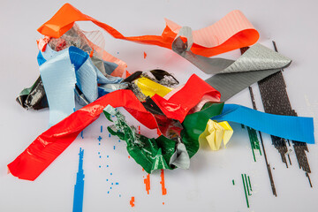 Colored duct tapes. Colorful rolls of rainbow colored adhesive tape on a white background. Colored...