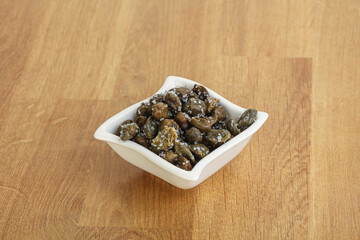 Salted marinated capers snack appetiser