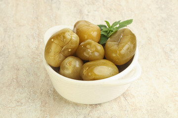 Pickled green tomato in the bowl