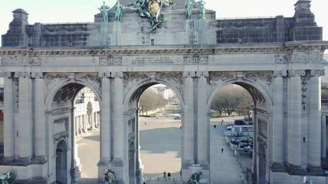 The Triumphal arch (Arc de Triomphe) in the Cinquantenaire park in Brussels for the 50th anniversary of the independence og Belgium. Drone aerial view