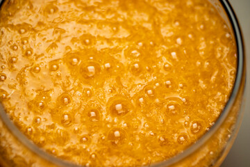 particulate fresh orange juice, bubbly.