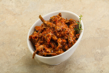 Canned anchovy in tomato sauce