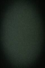 background or texture in the form of a green uniform dark green fabric