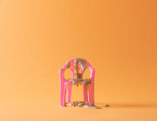 Chair and gel on an orange background. Holiday cocncept