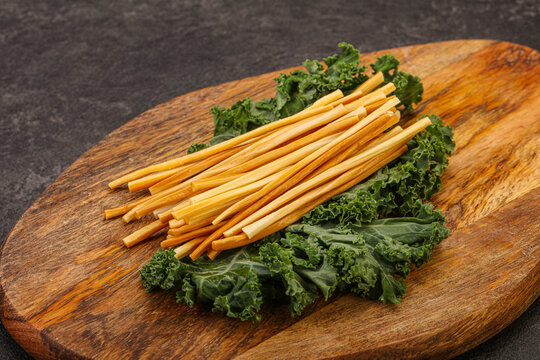 Chechel cheese sticks over board