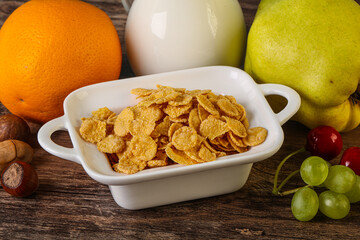 Breakfast with corn flakes and milk