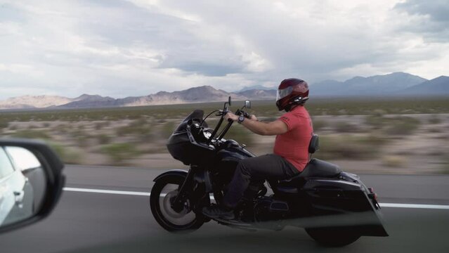 Biker driving on the Highway on legendary Route 66 to Oatman, Arizona.