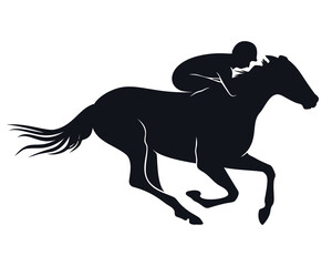 Silhouette of horseback rider on galloping horse