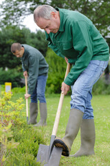 the man digs a hole