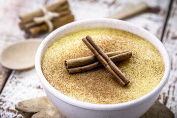 curau, typical sweet from the state of Minas Gerais, made in Brazil, served and decorated with cinnamon, rustic and rural cuisine