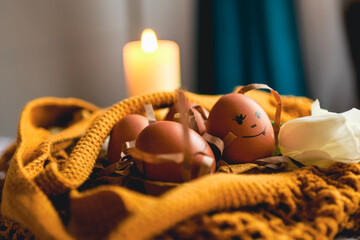 Easter eggs on rustic table with white tulips