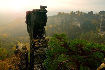 rock formation Wehlnadel at sunrise with backlight