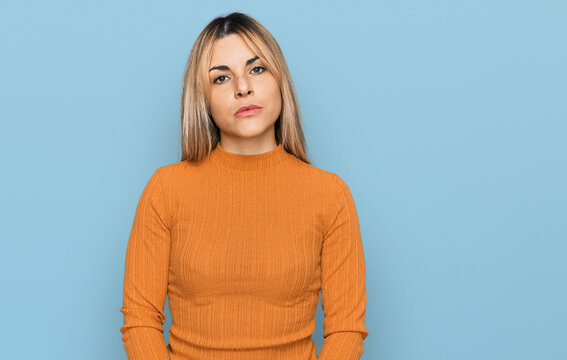 Young caucasian woman wearing casual clothes relaxed with serious expression on face. simple and natural looking at the camera.