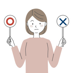 まるばつの札を持つ女性