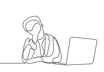 an office worker tired at the computer