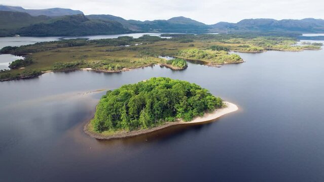 Aerial Over Of Isle Maree In Loch Maree In Scotland. Parallax View